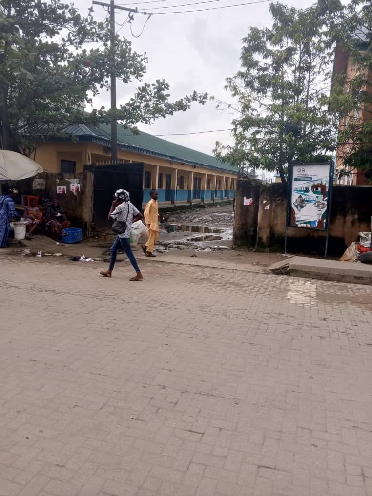 Old students of Girls Academy, Lagos cry out over dangerous electricity pole, flooding